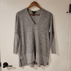 Oversized gray V-neck sweater